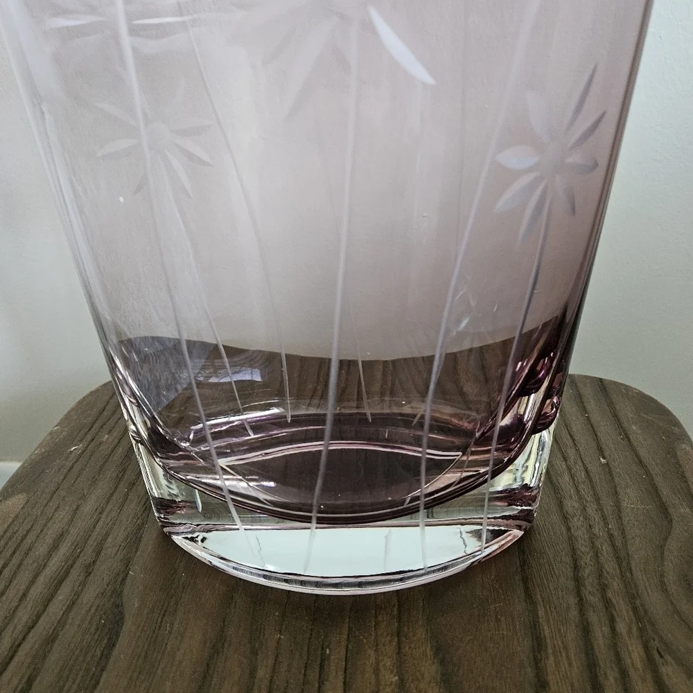 Elegant oval clear cut purple vase.